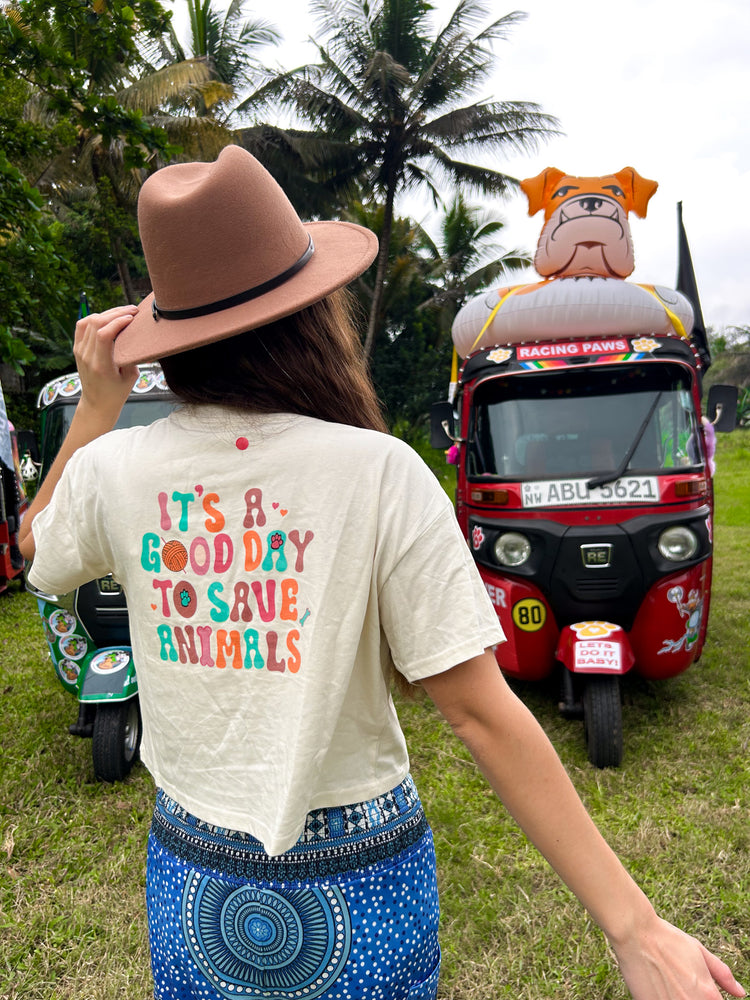 
                  
                    Blue Paw! It's a Good Day to Save Animals Cropped T- Shirt
                  
                